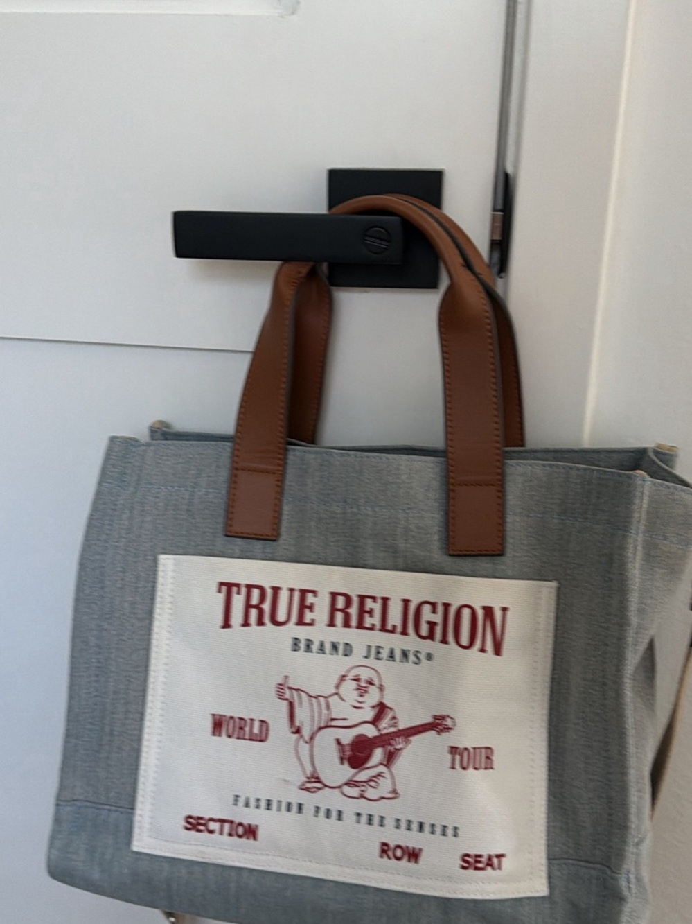 True Religion Gray Canvas Tote with Brown Leather Handles and Red Logo Patch